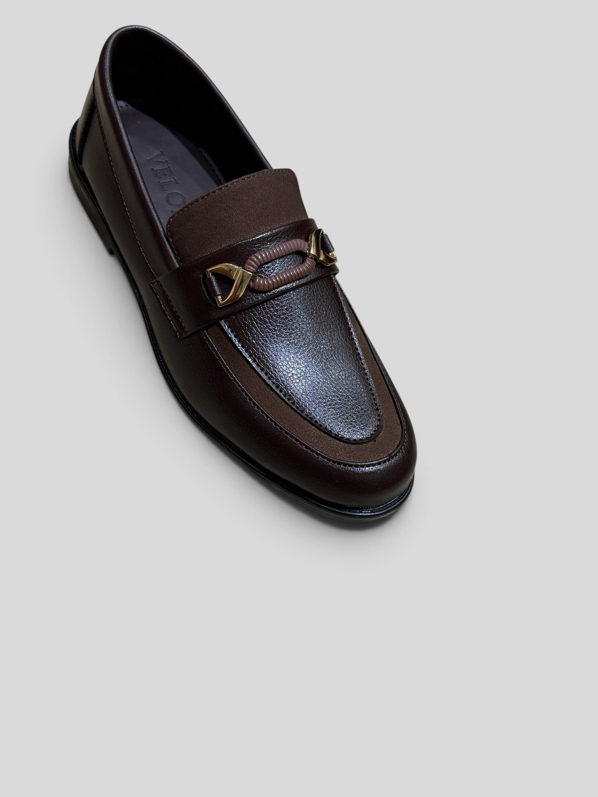 VELORO dark brown textured formal loafers for men with gold-toned metal hardware detail on the vamp.